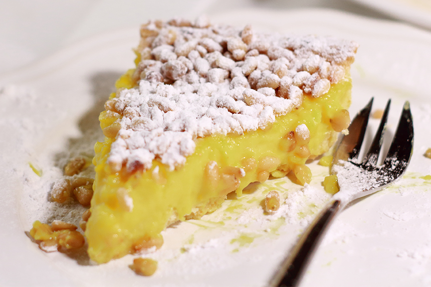 torta ai pinoli con crema all'arancia